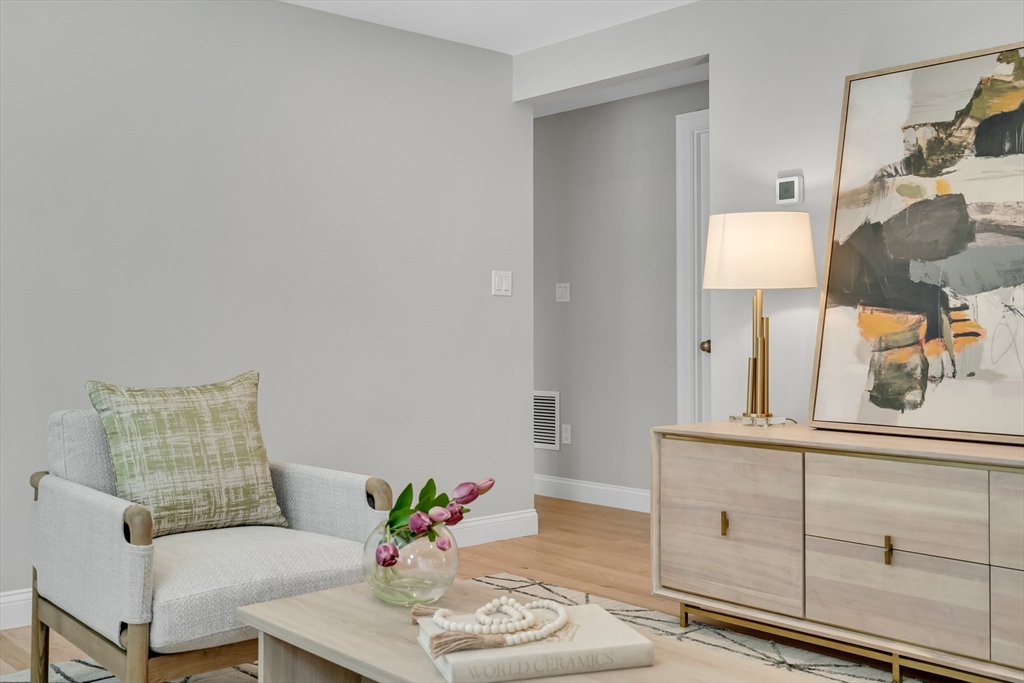 956 Waltham Street Lexington, MA 02421 - Photo 6 of 41 a living room with furniture and wooden floor