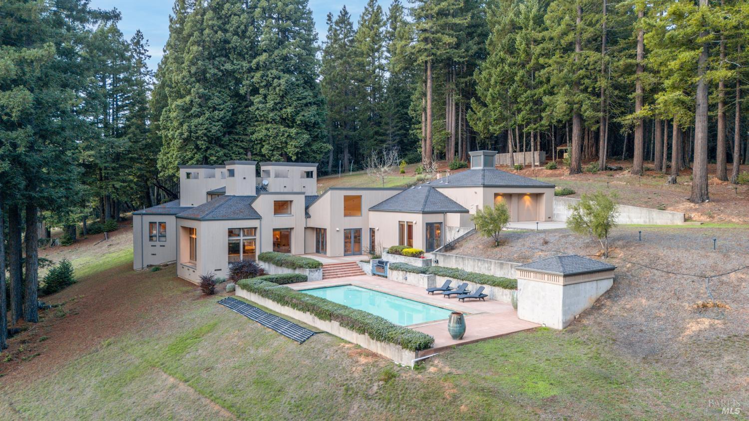 700 Holmes Ranch Road Philo, CA 95466 - Photo 2 of 42 an aerial view of a house with a yard basket ball court and outdoor seating