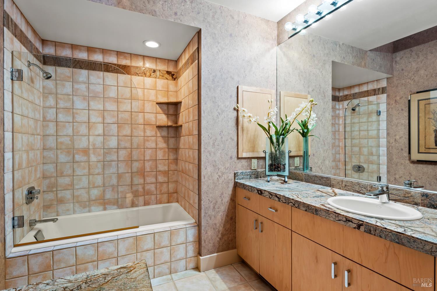 700 Holmes Ranch Road Philo, CA 95466 - Photo 28 of 42 a bathroom with a granite countertop sink a mirror a bathtub and shower