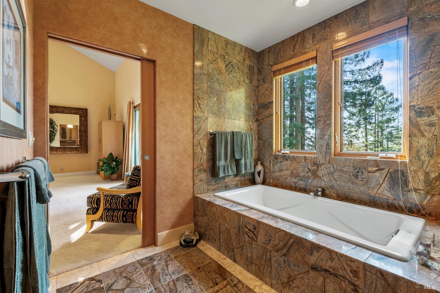 700 Holmes Ranch Road Philo, CA 95466 - Photo 31 of 42 a spacious bathroom with a tub and shower