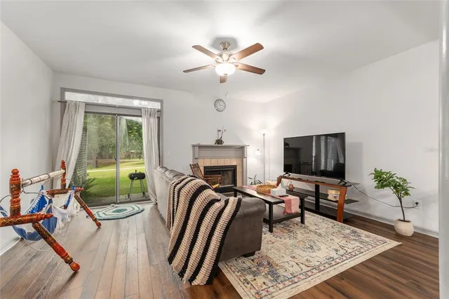 a view of walk in closet with clothes