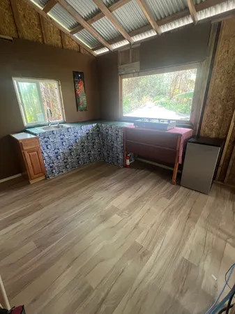 a room with a bed and a window
