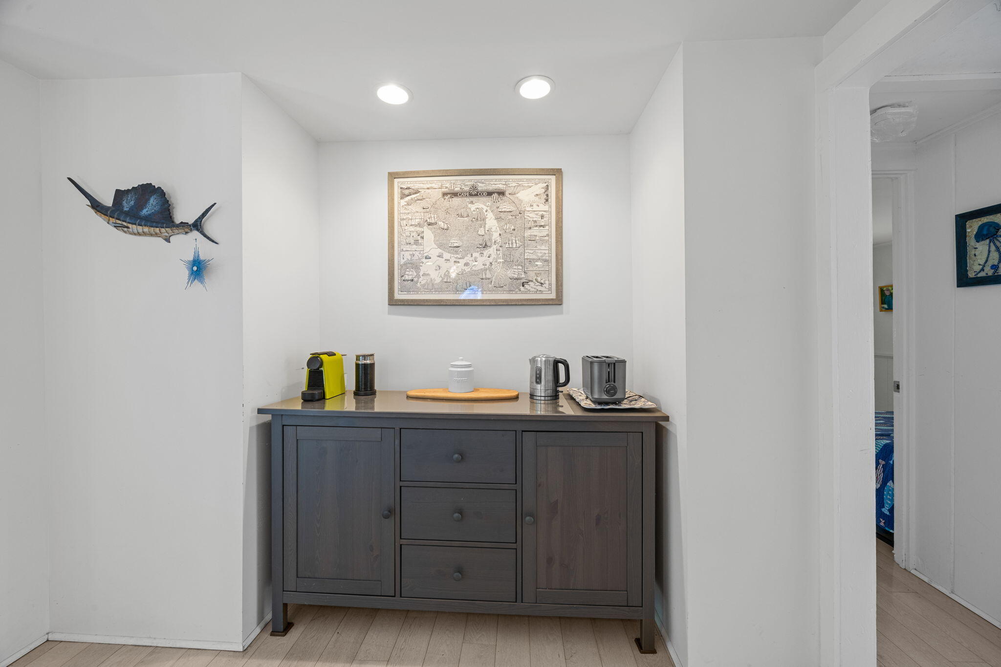 210 Chequessett Neck Road, Unit C Wellfleet, MA 02667 - Photo 16 of 37 a view of room with cabinets and wooden floor