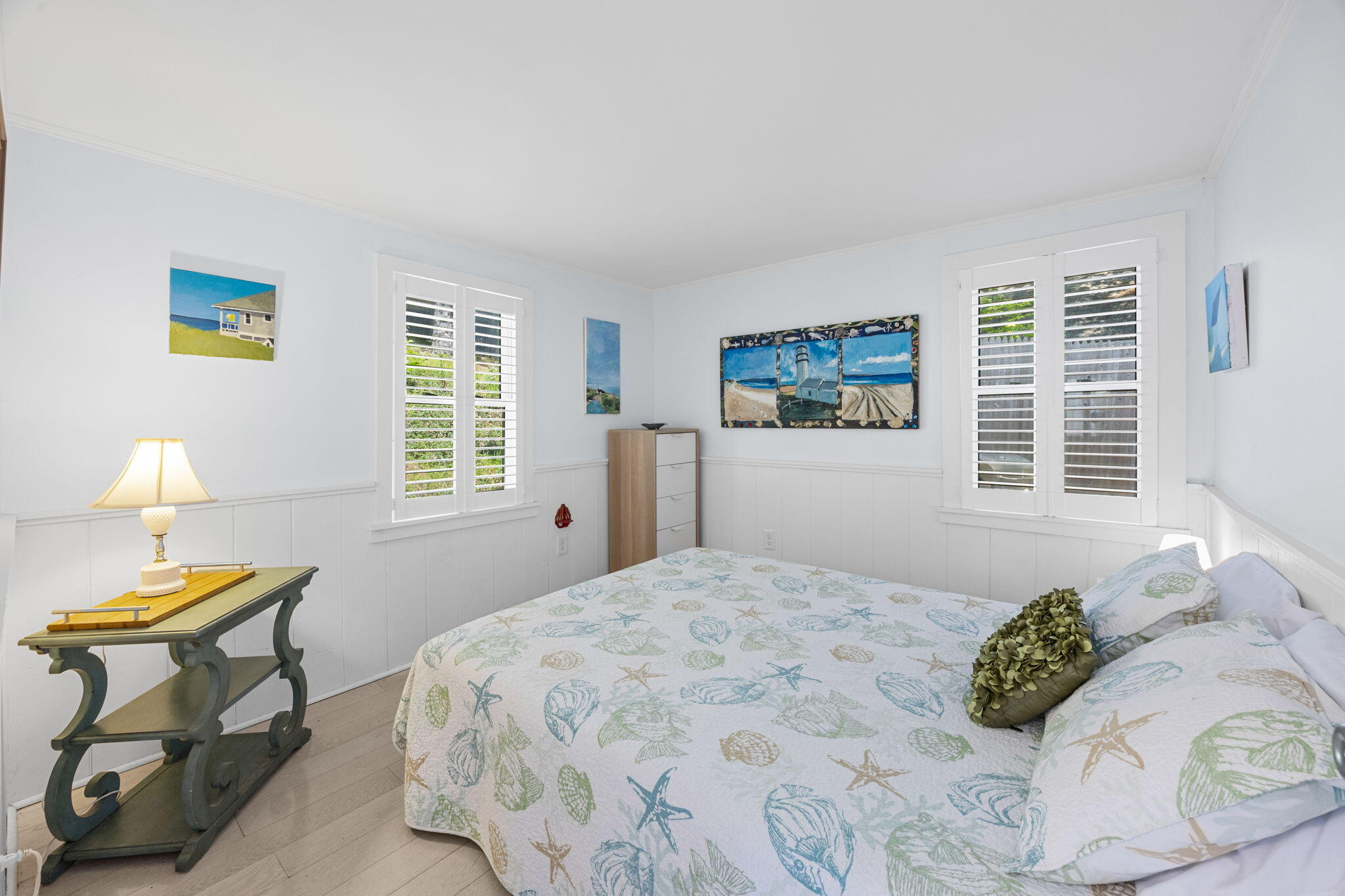 210 Chequessett Neck Road, Unit C Wellfleet, MA 02667 - Photo 18 of 37 a bedroom with a bed and a window