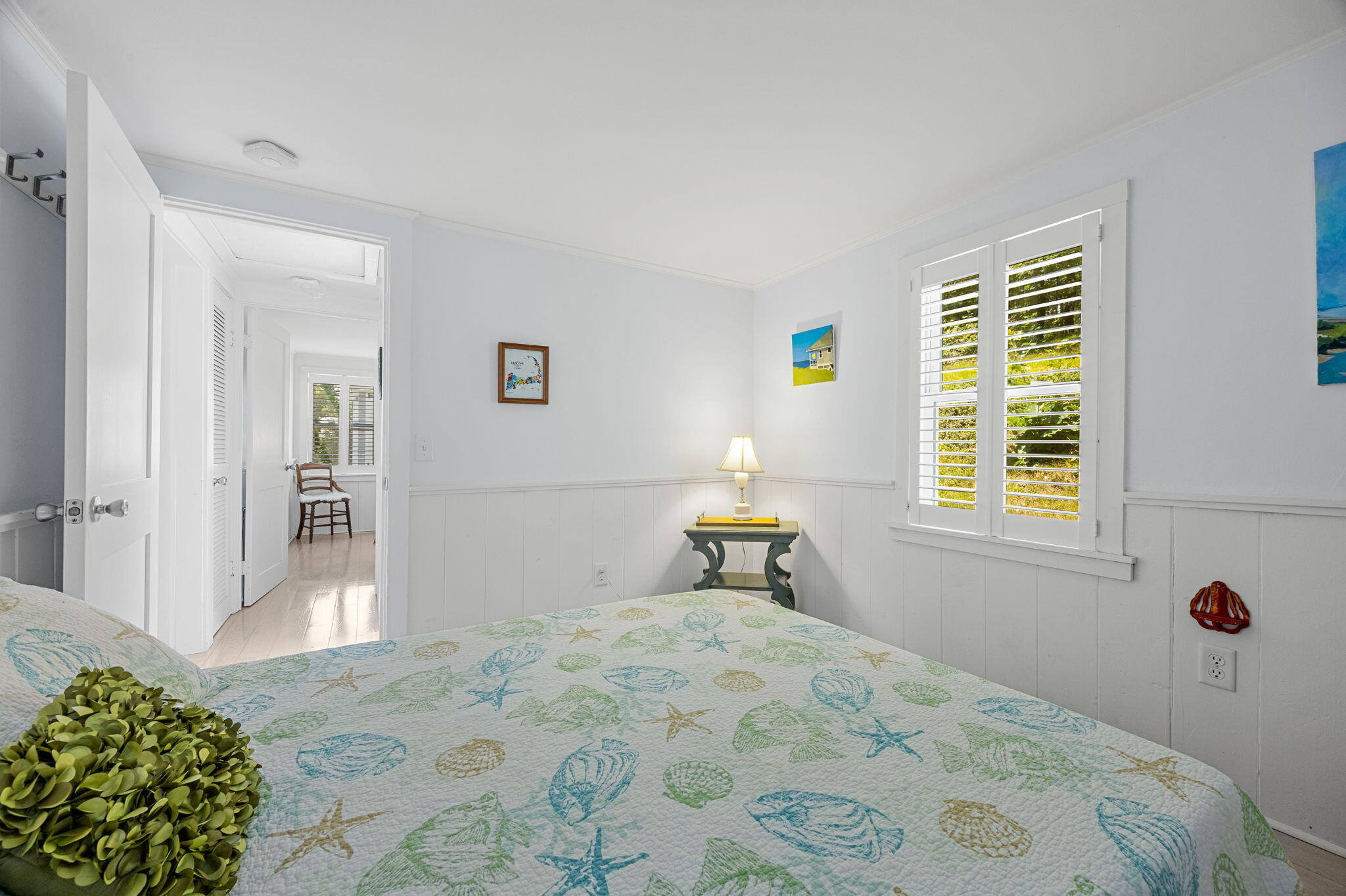 210 Chequessett Neck Road, Unit C Wellfleet, MA 02667 - Photo 19 of 37 a bedroom with a bed and a window