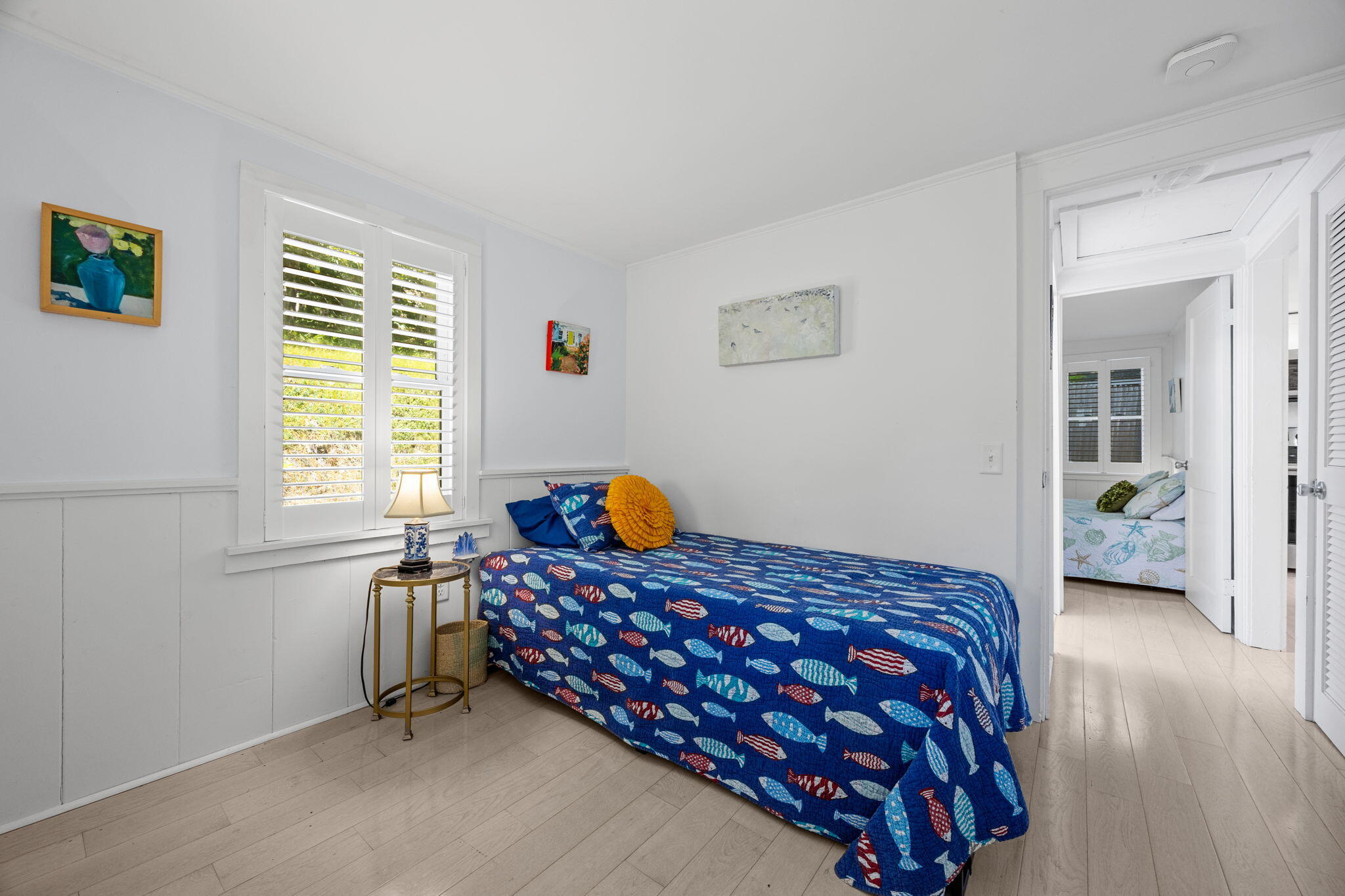 210 Chequessett Neck Road, Unit C Wellfleet, MA 02667 - Photo 21 of 37 a bedroom with a bed and a window