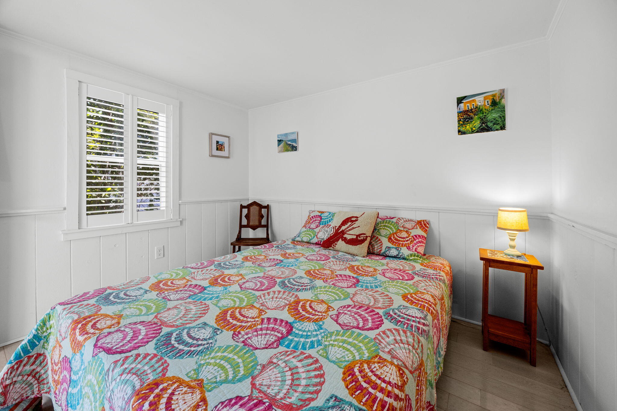 210 Chequessett Neck Road, Unit C Wellfleet, MA 02667 - Photo 23 of 37 a bedroom with a bed and a window