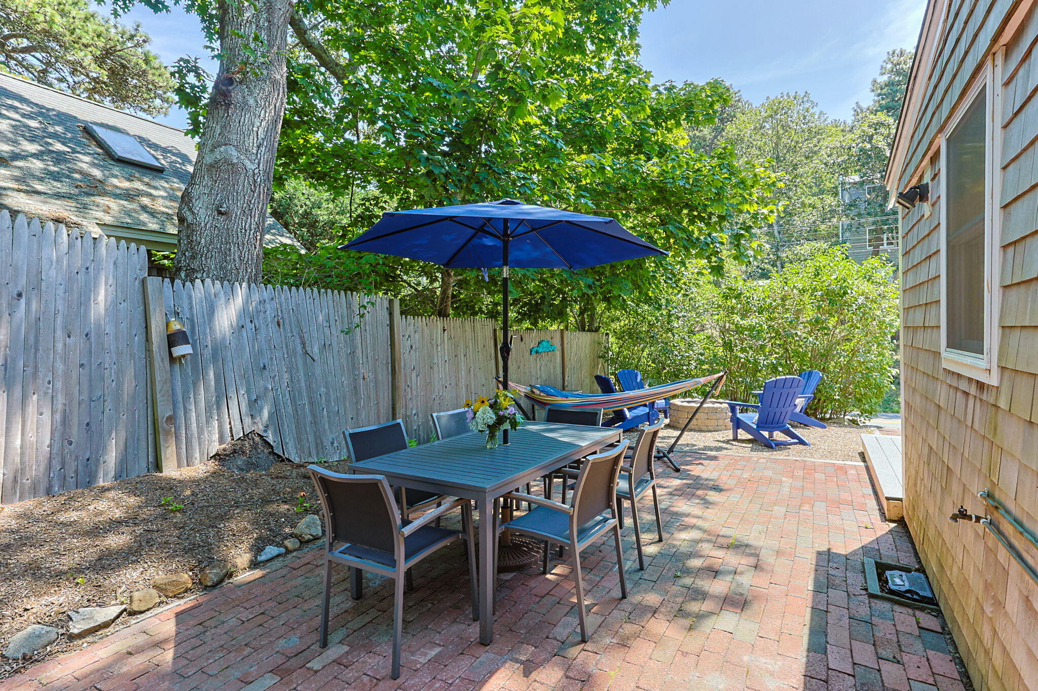 210 Chequessett Neck Road, Unit C Wellfleet, MA 02667 - Photo 26 of 37 an outdoor space with furniture