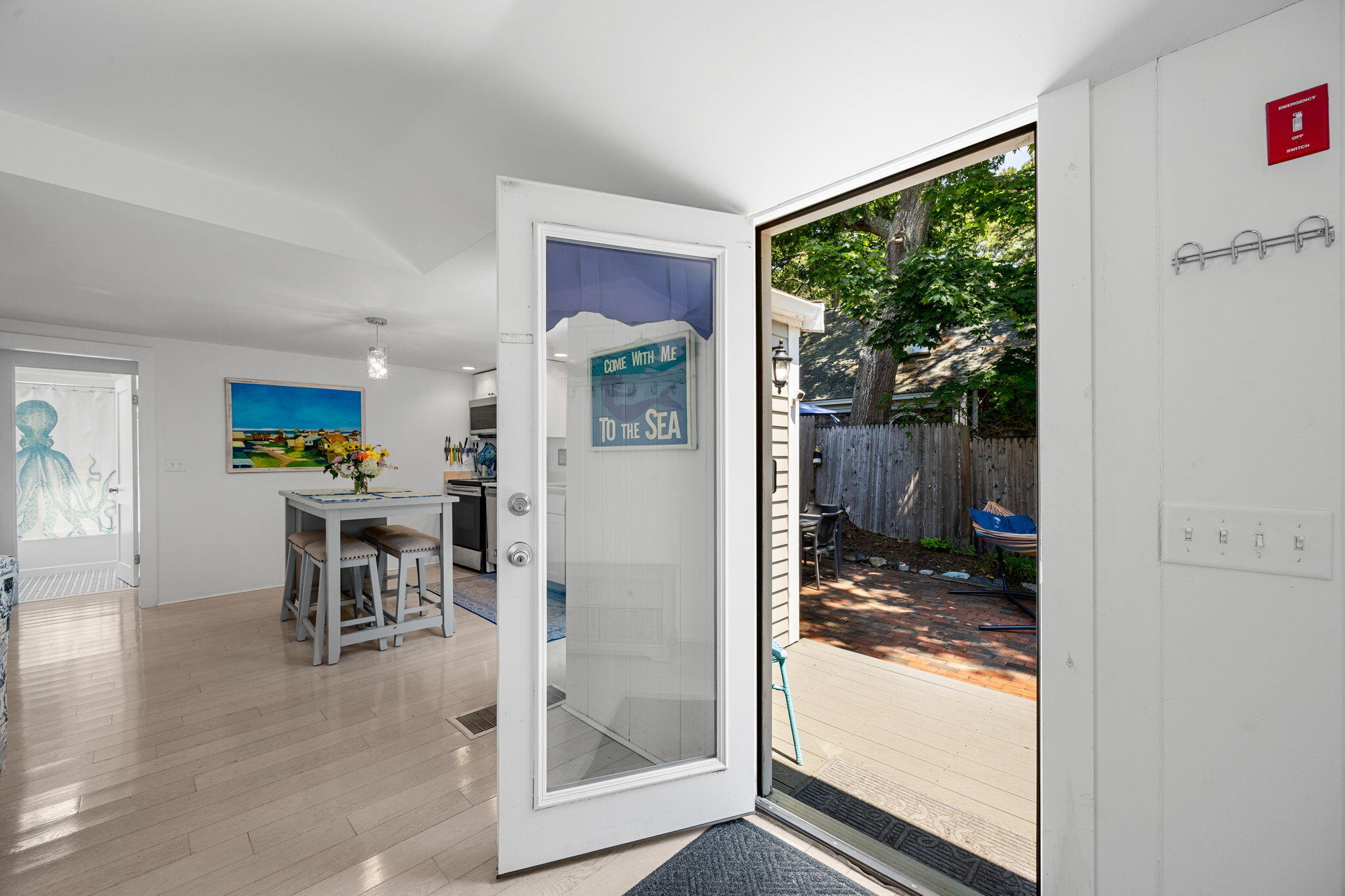 210 Chequessett Neck Road, Unit C Wellfleet, MA 02667 - Photo 5 of 37 a living room with furniture and a window