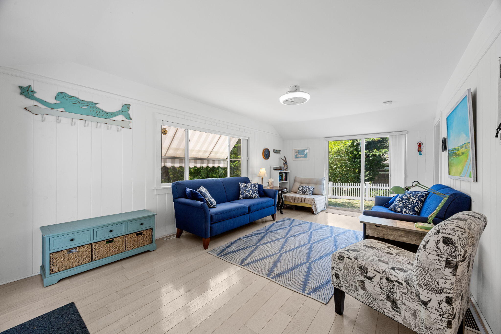 210 Chequessett Neck Road, Unit C Wellfleet, MA 02667 - Photo 6 of 37 a living room with furniture and a window