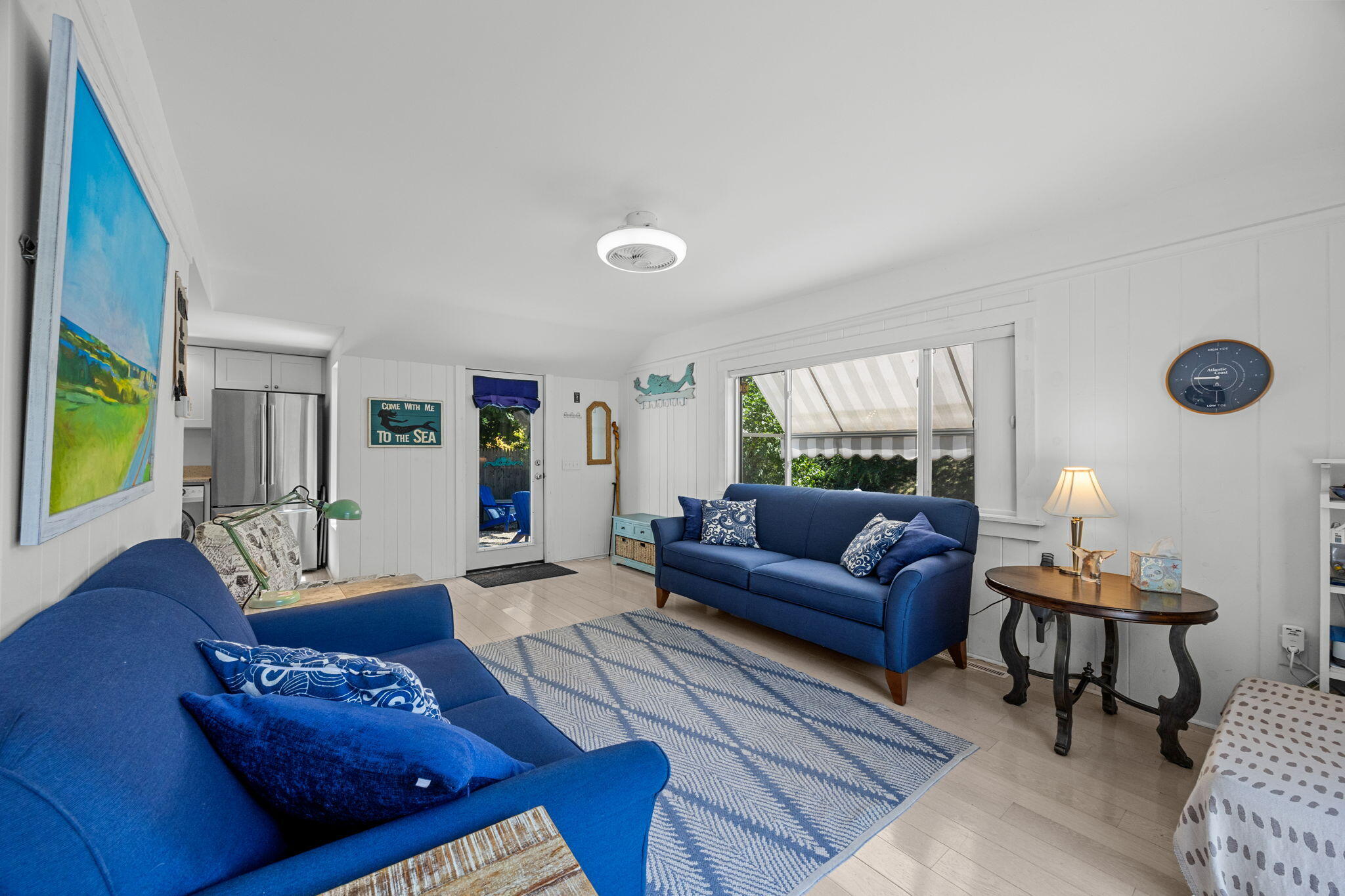 210 Chequessett Neck Road, Unit C Wellfleet, MA 02667 - Photo 8 of 37 a living room with furniture and wooden floor