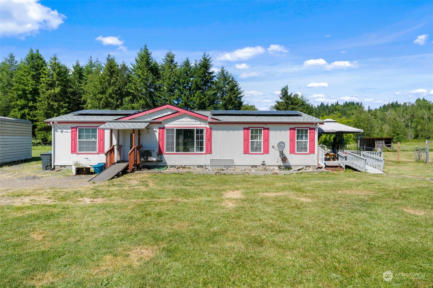 503 North Fork Road Chehalis, WA 98532 - Photo 9 of 38 a front view of a house with swimming pool having outdoor seating