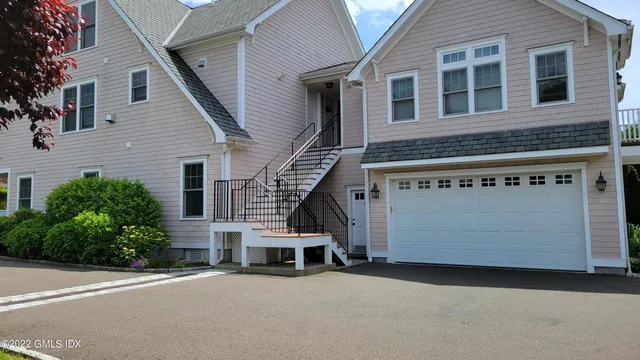a view of a house with a street