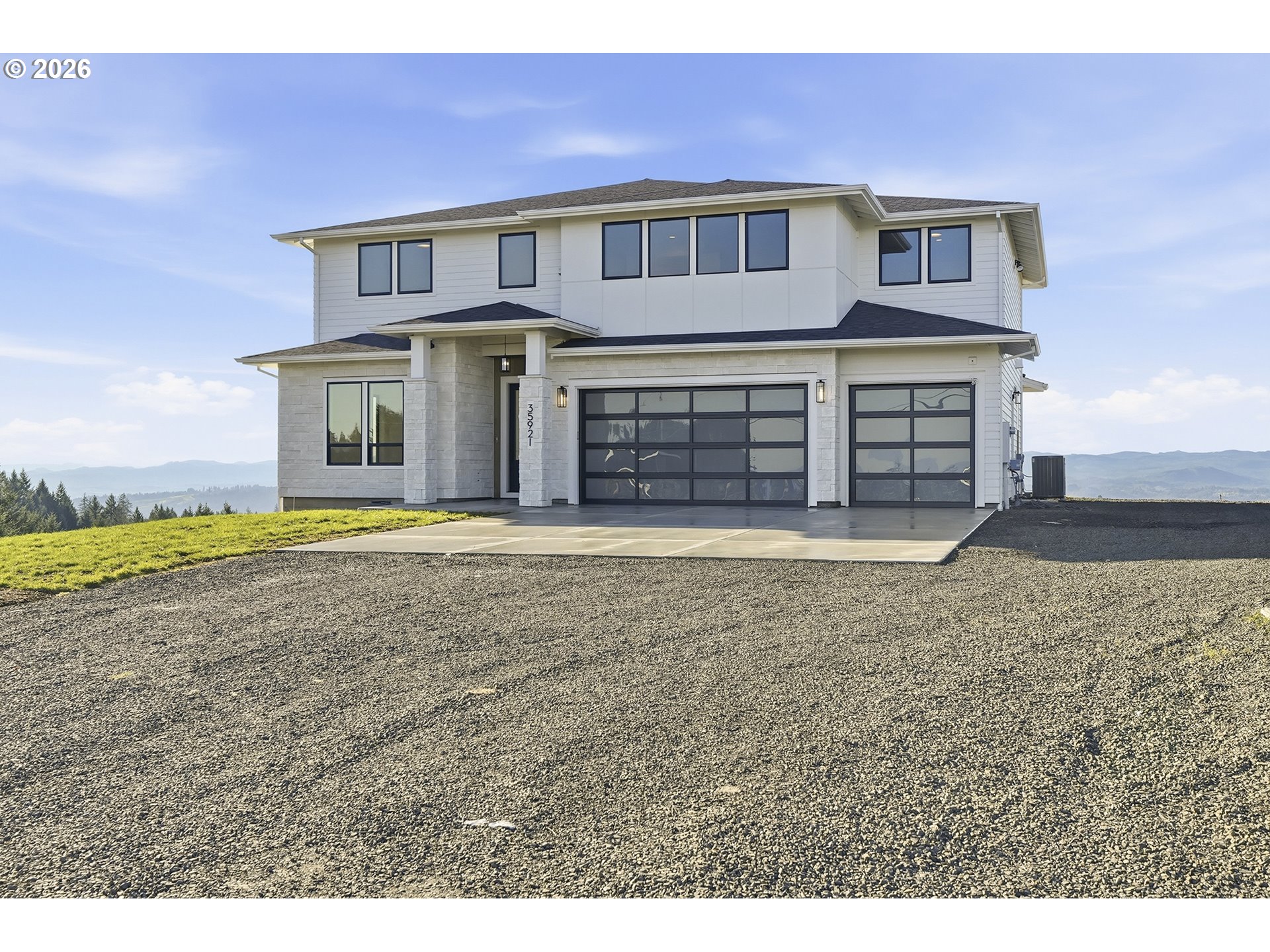 a view of a house with a yard