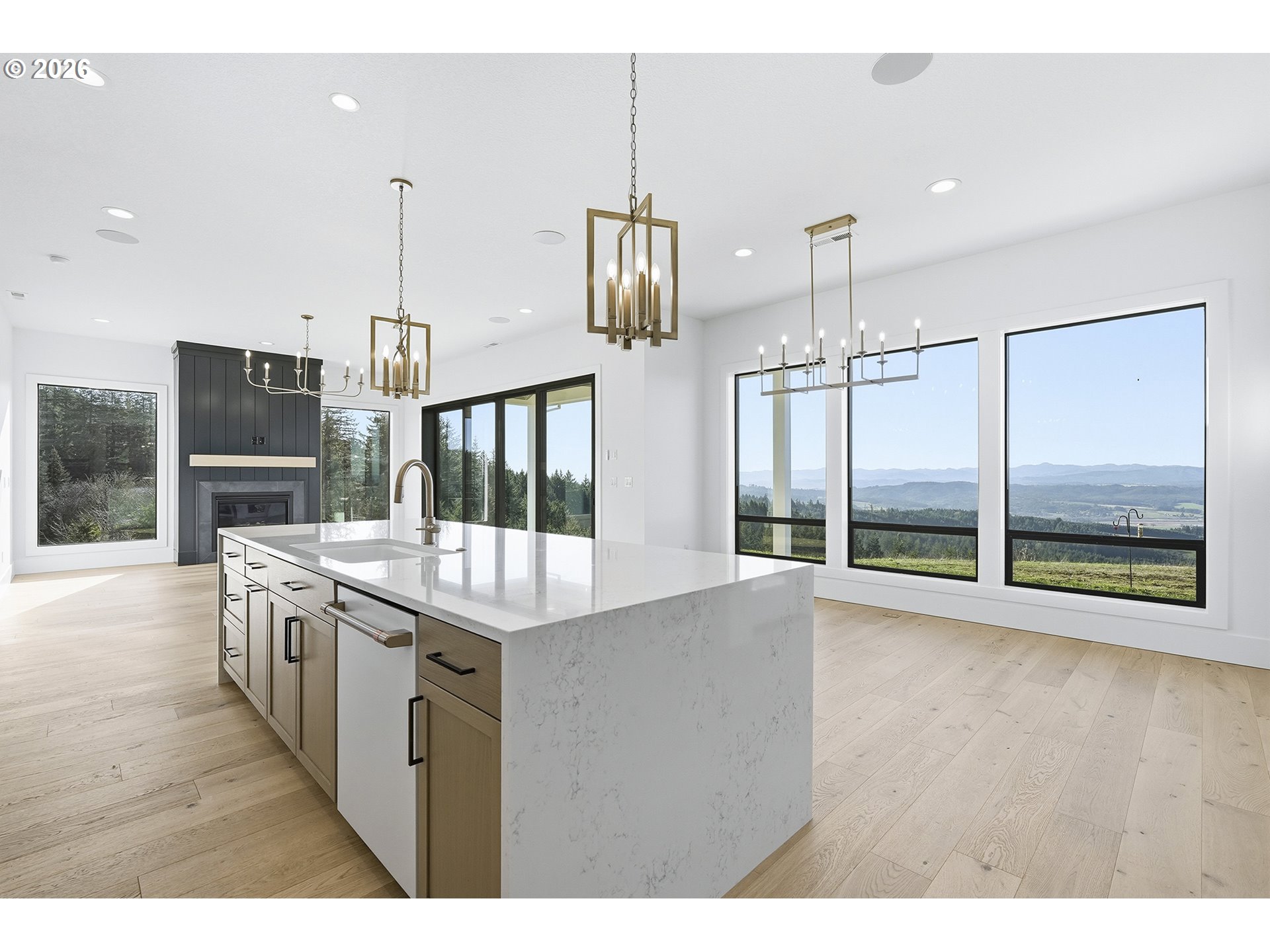 35921 Southwest Bald Peak Road Hillsboro, OR 97123 - Photo 15 of 48 a kitchen with stainless steel appliances granite countertop a stove and a wooden floors