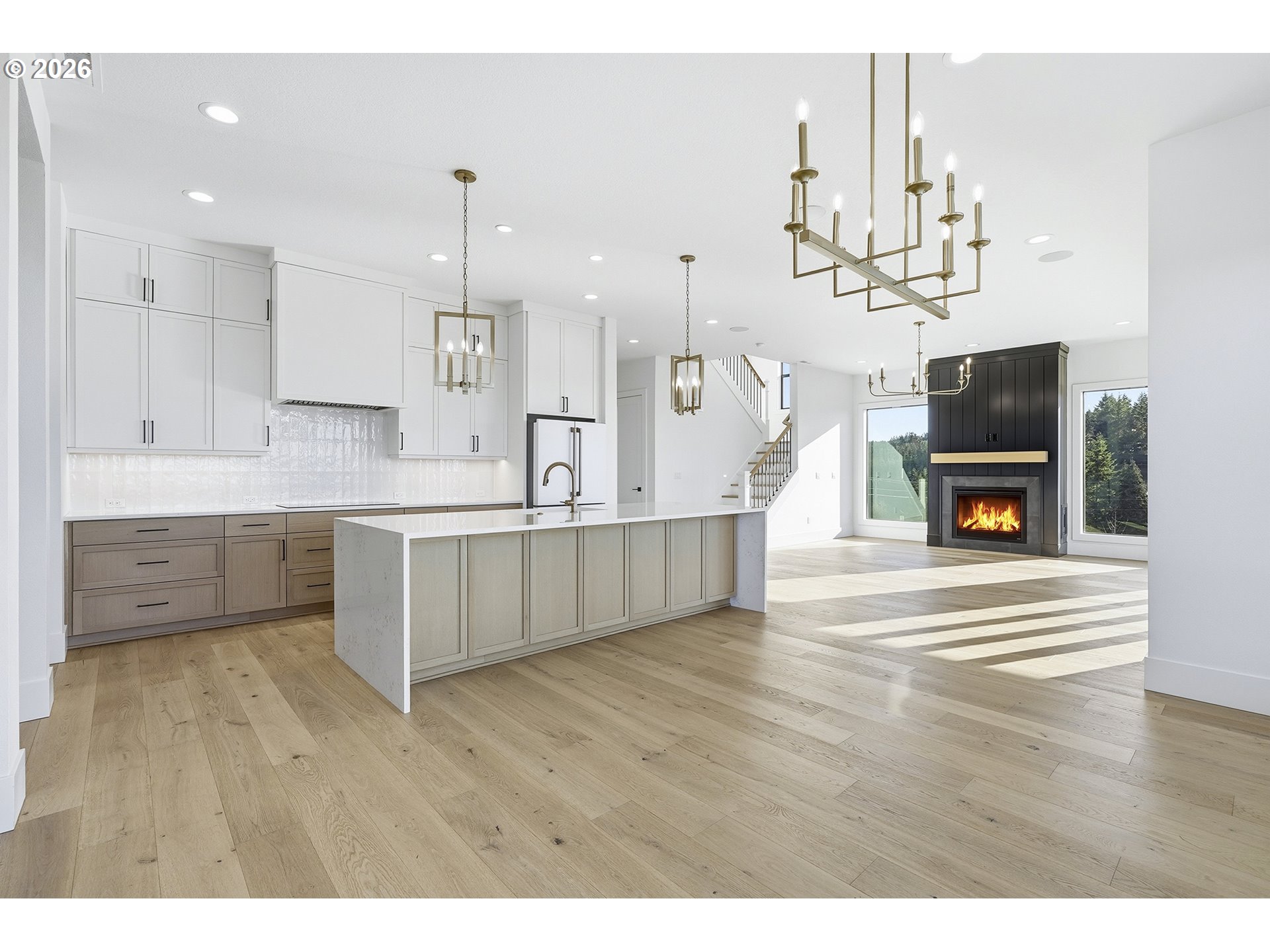 35921 Southwest Bald Peak Road Hillsboro, OR 97123 - Photo 18 of 48 a living room with kitchen island furniture and a fireplace
