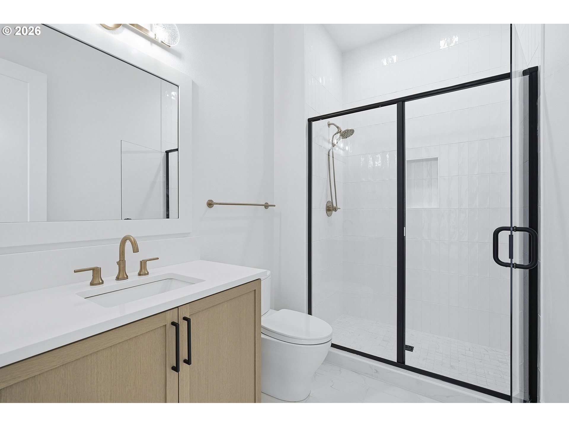 35921 Southwest Bald Peak Road Hillsboro, OR 97123 - Photo 23 of 48 a bathroom with a shower sink vanity and a mirror