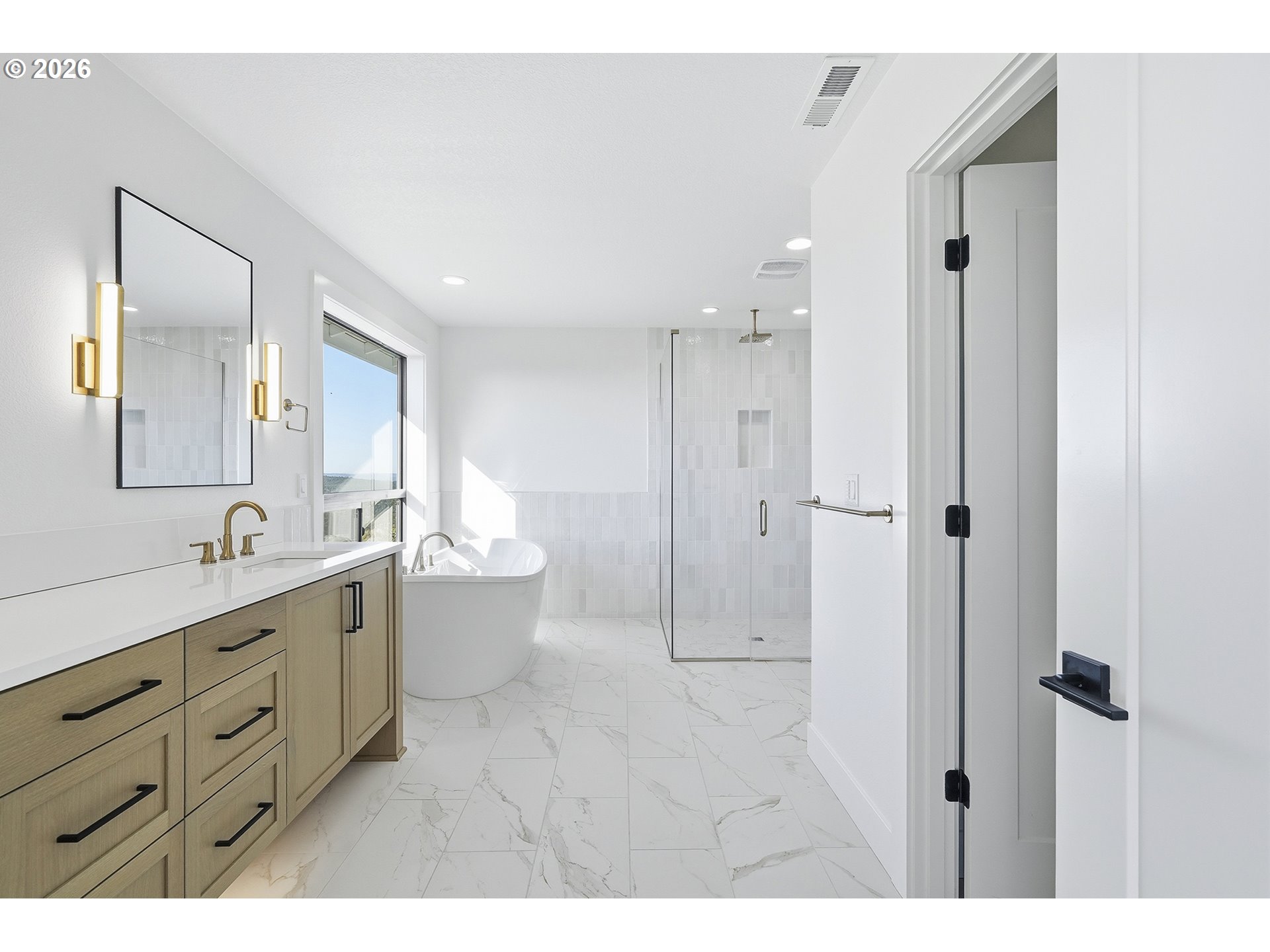 35921 Southwest Bald Peak Road Hillsboro, OR 97123 - Photo 27 of 48 a bathroom with a double vanity sink mirror and bathtub