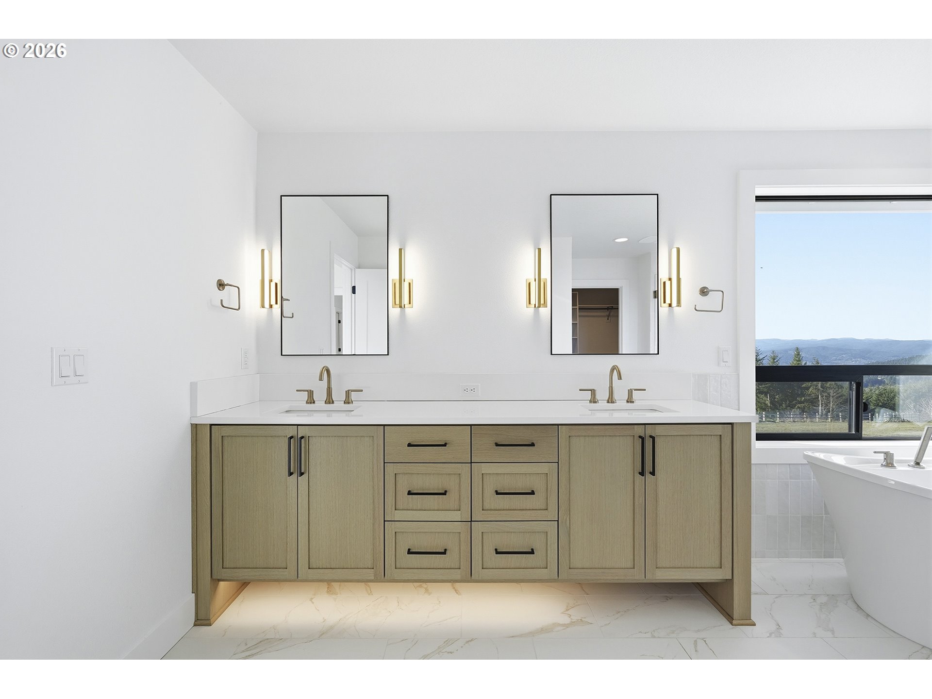 35921 Southwest Bald Peak Road Hillsboro, OR 97123 - Photo 29 of 48 a spacious bathroom with a double vanity sink mirror and bathtub