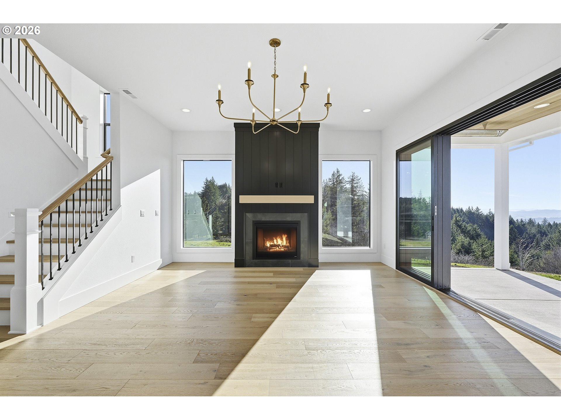 35921 Southwest Bald Peak Road Hillsboro, OR 97123 - Photo 6 of 48 a living room with furniture and a fireplace