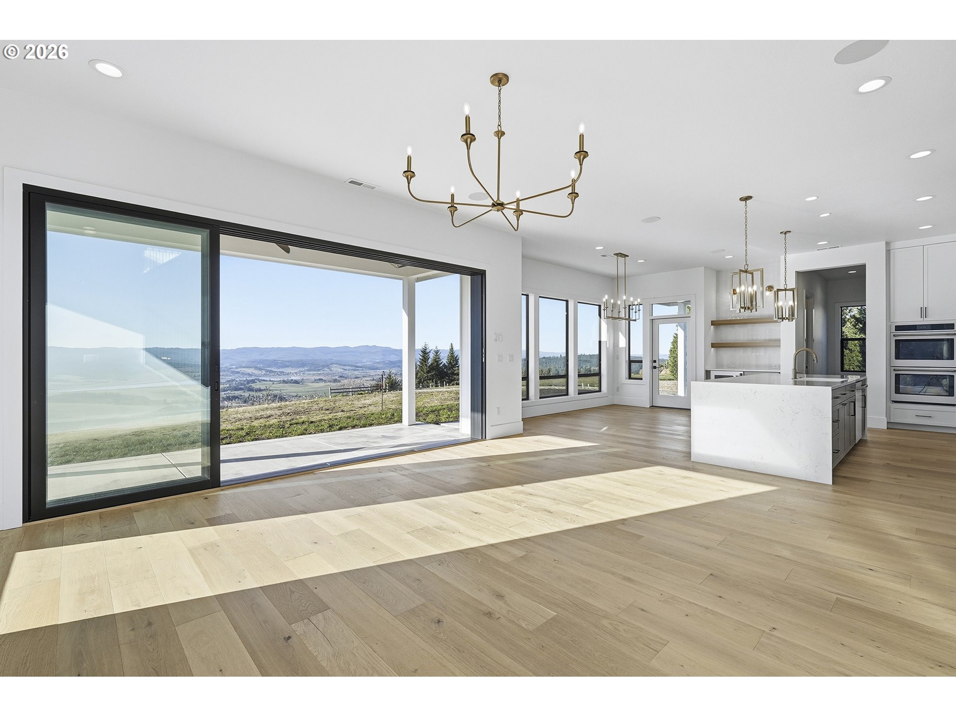 35921 Southwest Bald Peak Road Hillsboro, OR 97123 - Photo 9 of 48 a view of a living room and a floor to ceiling window