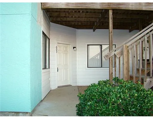 a view of a house with a wooden door