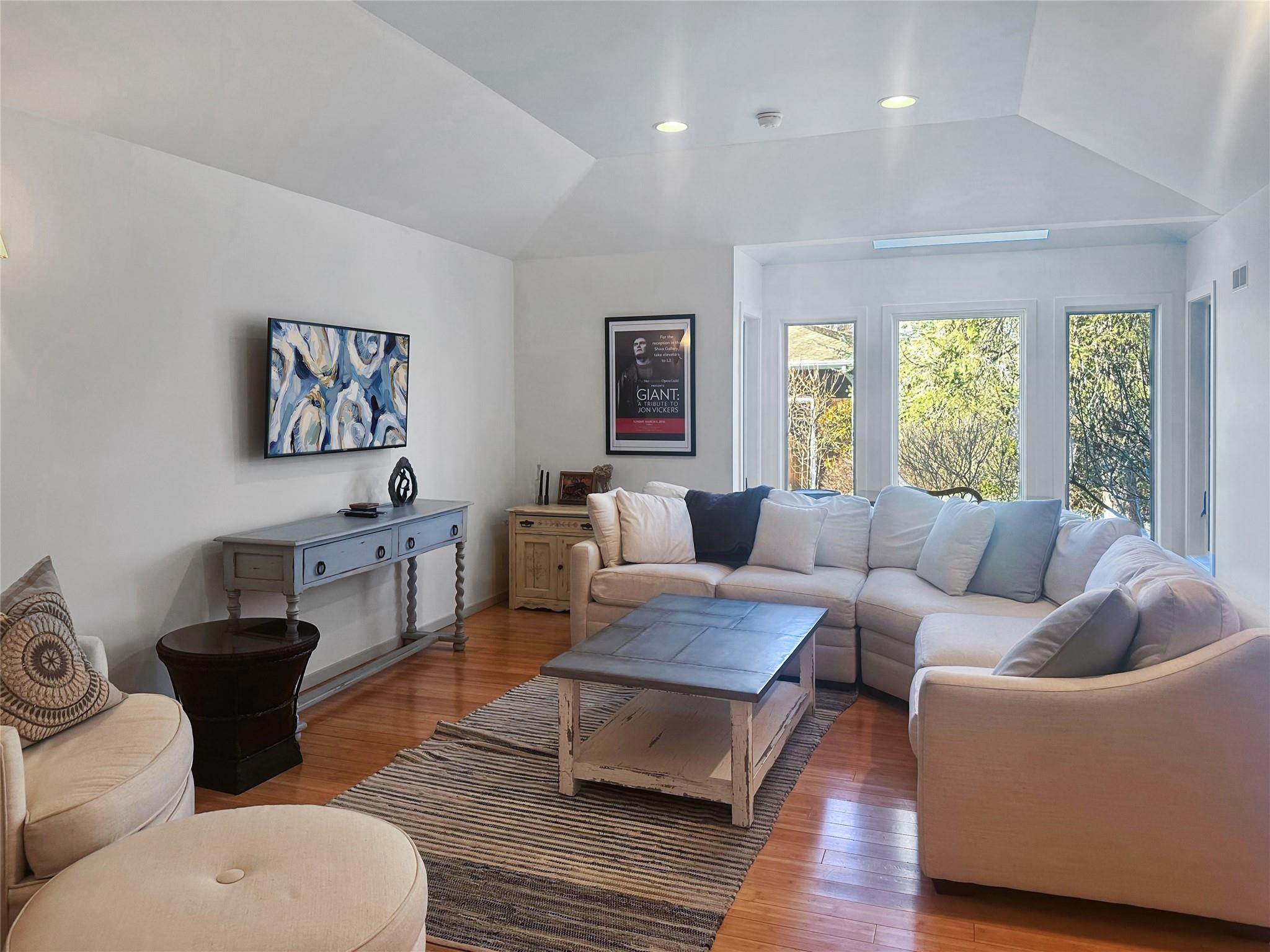 250 Pine Tree Court Cutchogue, NY 11935 - Photo 19 of 25 a living room with furniture and a large window