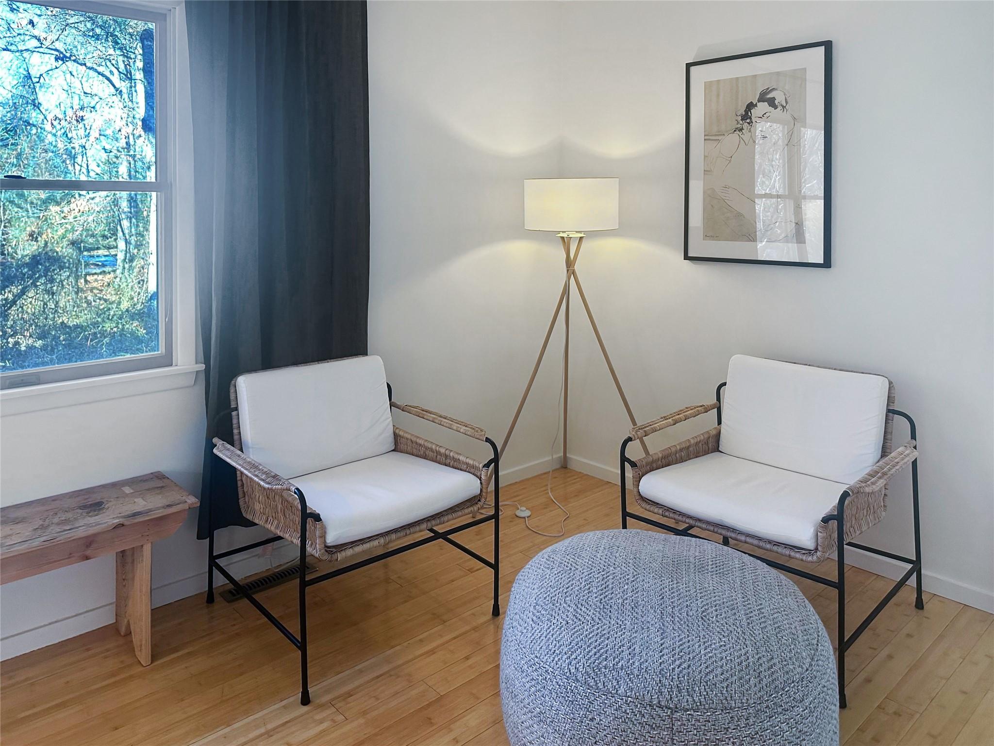 250 Pine Tree Court Cutchogue, NY 11935 - Photo 7 of 25 a living room with furniture and a window