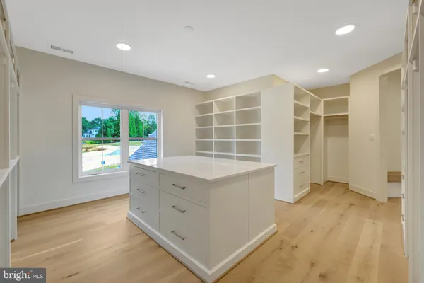 a room with furniture and wooden floor
