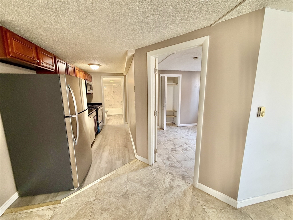 379 Meridian Street, Unit 101 Boston, MA 02128 - Photo 4 of 10 a view of a hallway