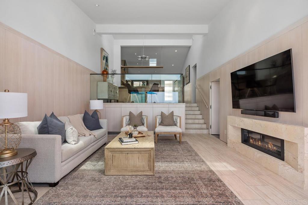 1856 Parliament Road Encinitas, CA 92024 - Photo 21 of 42 a living room with furniture and a flat screen tv