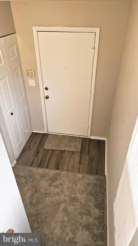 view of a room with wooden floor