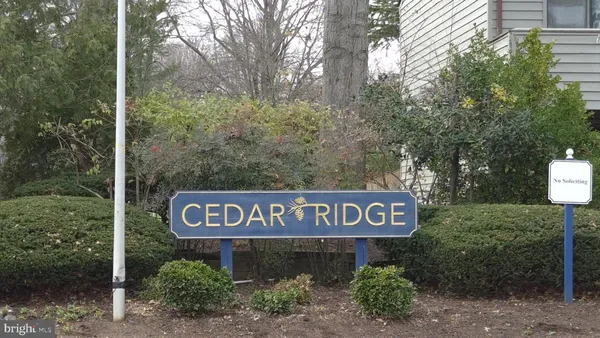 a sign broad next to a road