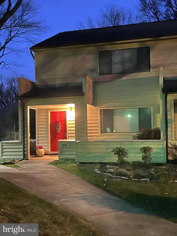 a front view of a house with garage