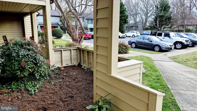 a view of street with parked cars