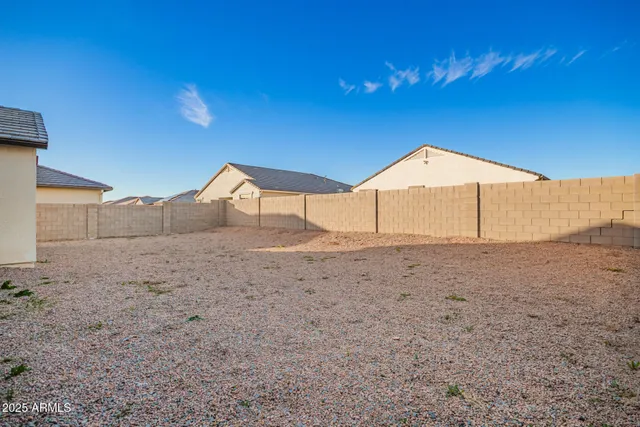 a house view with a backyard space