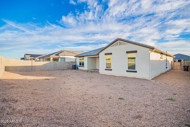 a view of backyard of house