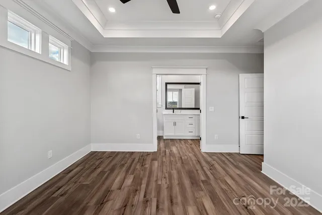a view of wooden floor in an empty room