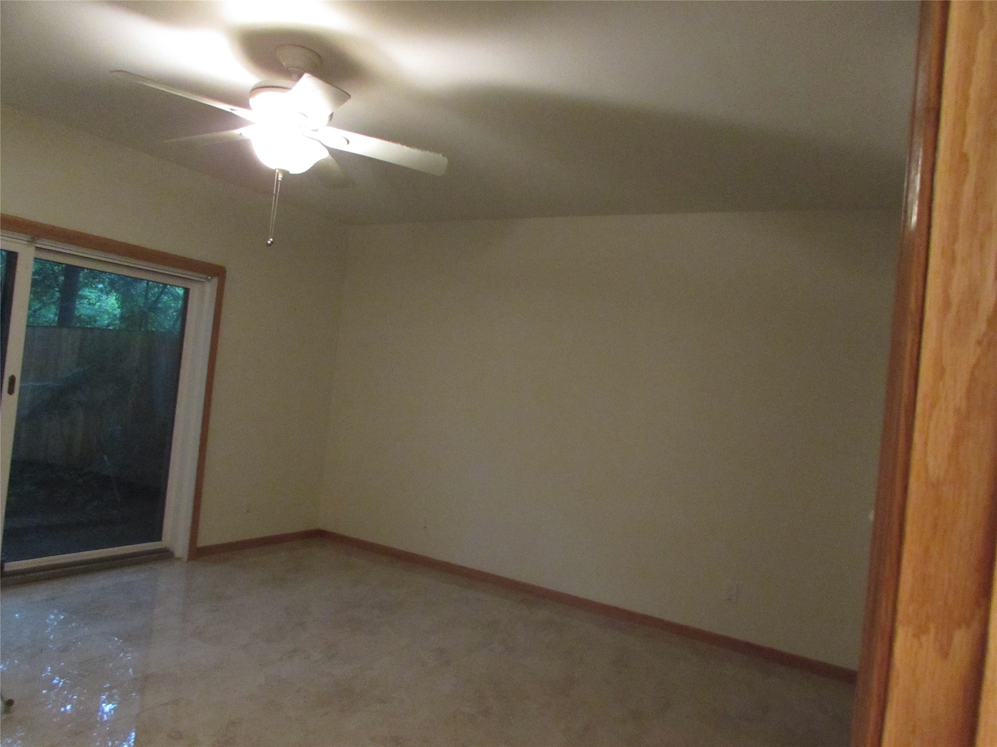 201 Vanderpool Lane, Unit 19 Houston, TX 77024 - Photo 16 of 23 a view of a small space with wooden floor and a window