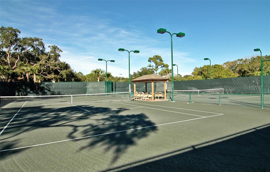2517 Glebe Farm Close, Unit H2 Sarasota, FL 34235 - Photo 56 of 59 a view of a tennis court