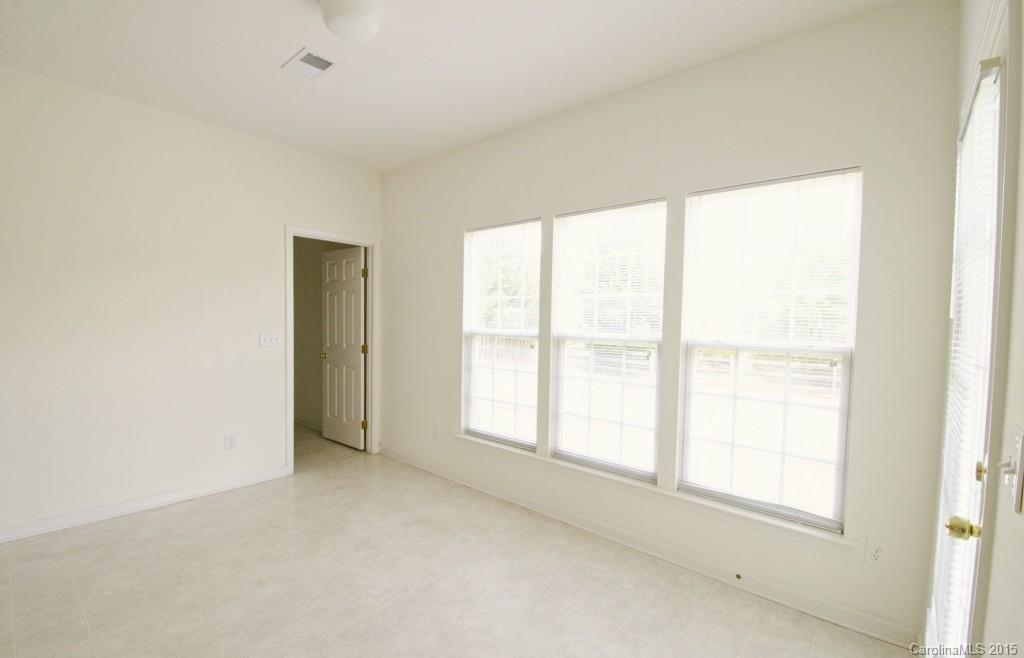 12809 Winget Road Charlotte, NC 28278 - Photo 16 of 23 a view of an empty room with a window