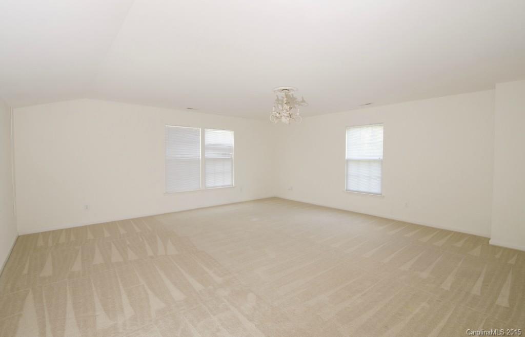 12809 Winget Road Charlotte, NC 28278 - Photo 20 of 23 an empty room with windows