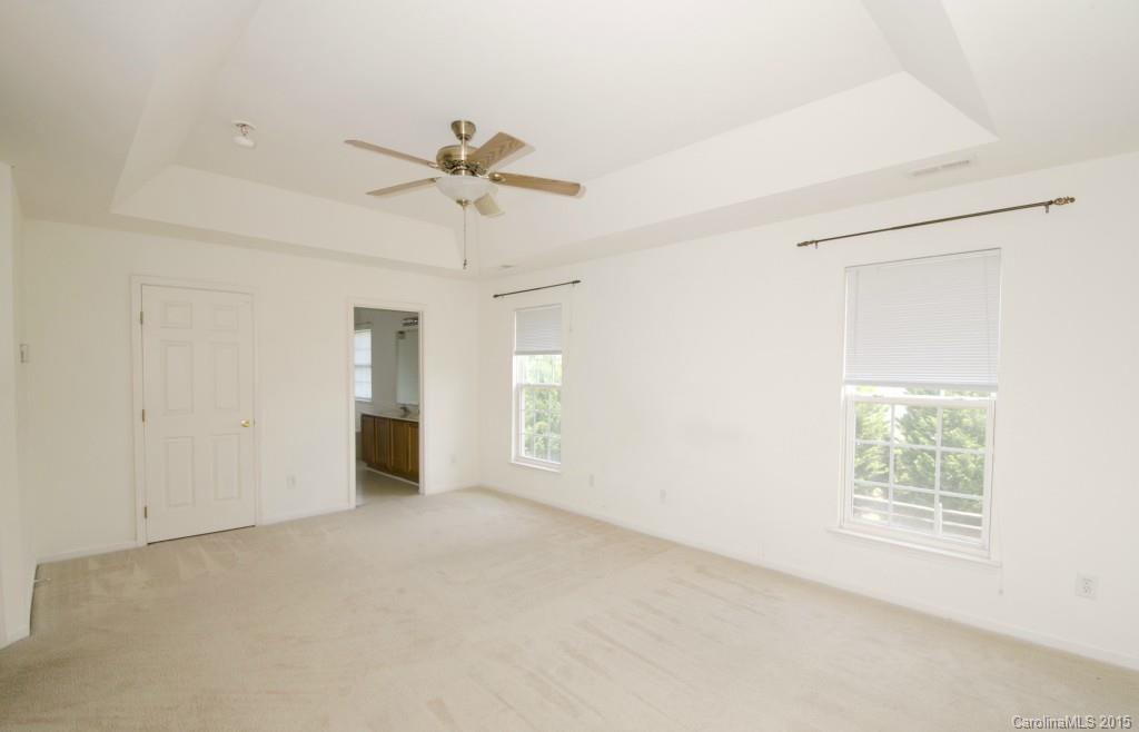 12809 Winget Road Charlotte, NC 28278 - Photo 21 of 23 a view of an empty room with a window
