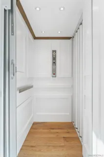 a bedroom with a bed and walk in closet