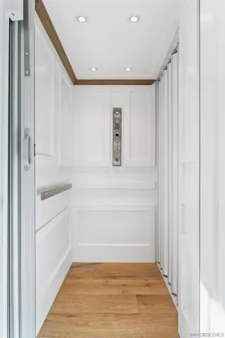 a bedroom with a bed and walk in closet