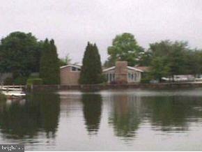 1 Club House Road Brick, NJ 08723 - Photo 3 of 6 a view of a lake view