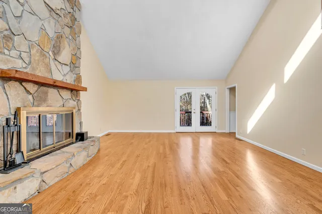 a view of wooden balcony with wooden floor