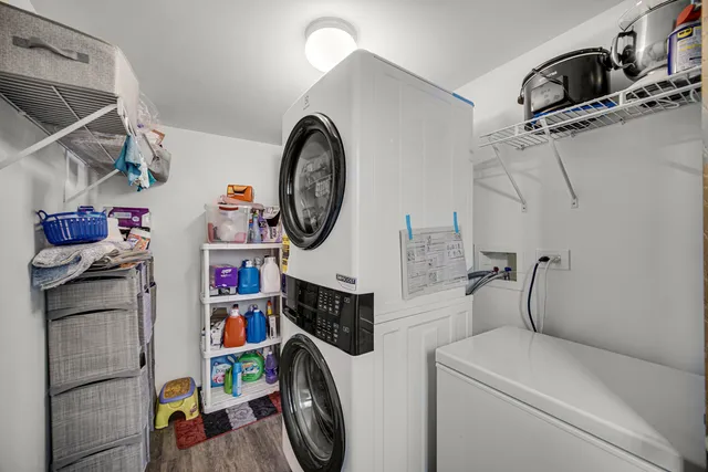 a view of storage and utility room with washer and dryer