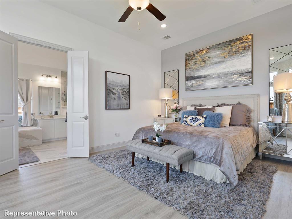 2204 Ridgecrest Lane Anna, TX 75409 - Photo 8 of 17 Spacious bedroom featuring wood-finish flooring, a ceiling fan, and recessed lighting