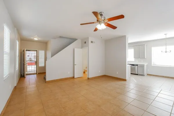 a view of livingroom with hardwood floor and a ceiling fan